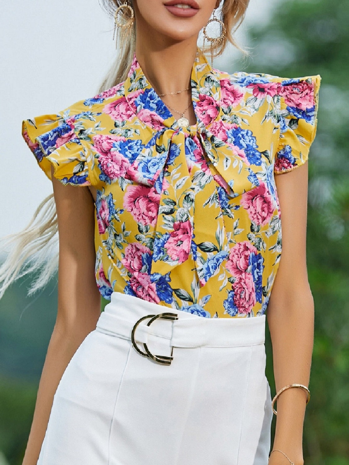 Ruffled Printed Tie Neck Cap Sleeve Blouse